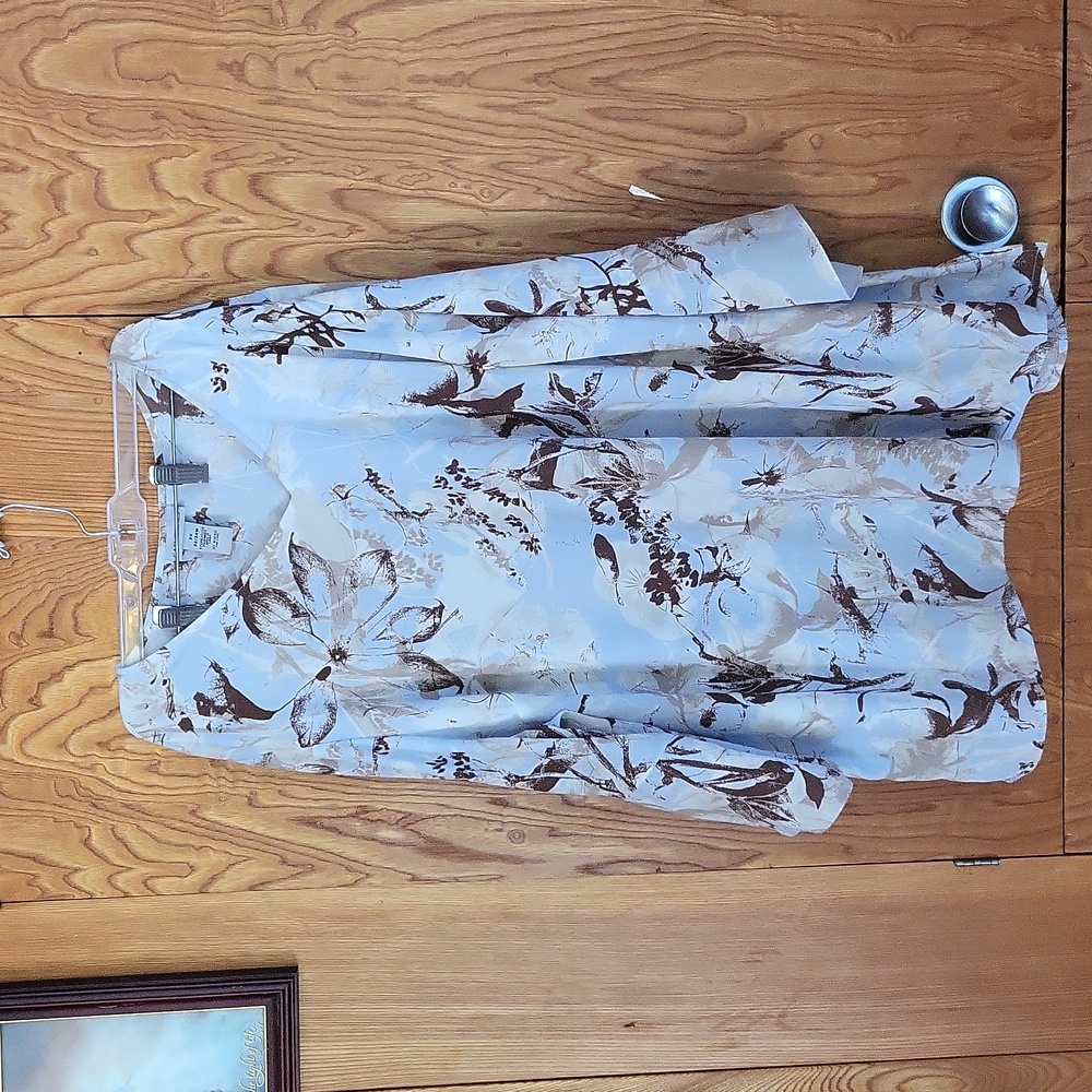 Catherine's pale blue, brown, tan and white floral blouse